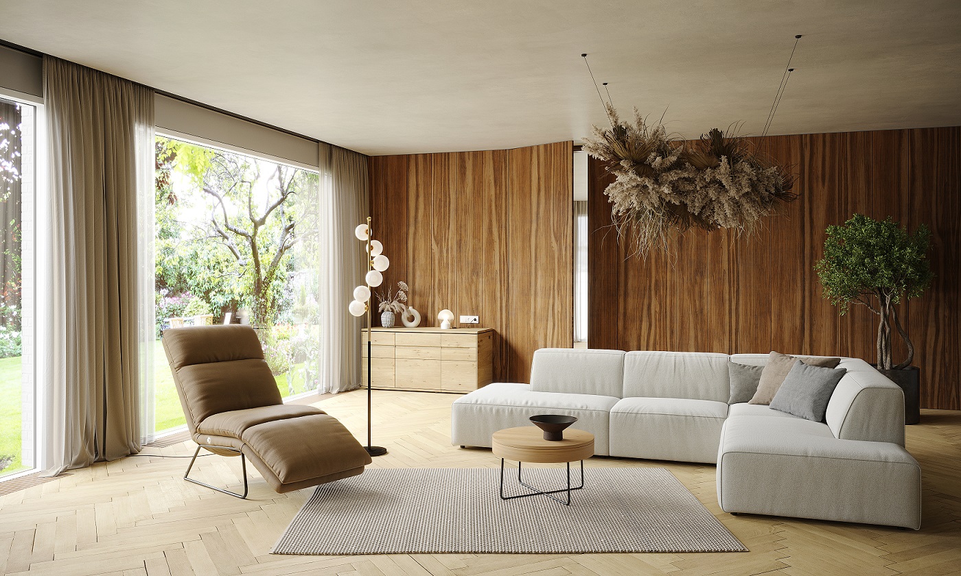 Wohnzimmer mit bodentiefem Sofa und Liege aus braunem Leder