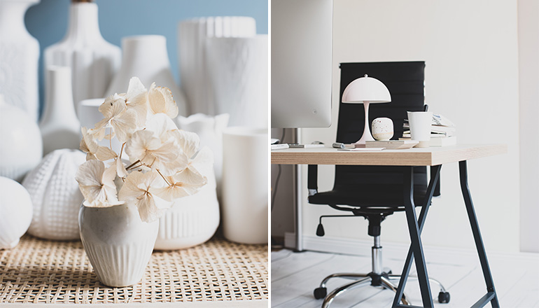 Weiße Vasen und aufgeräumtes Arbeitszimmer mit Tischlampe und  schwarzem Drehstuhl